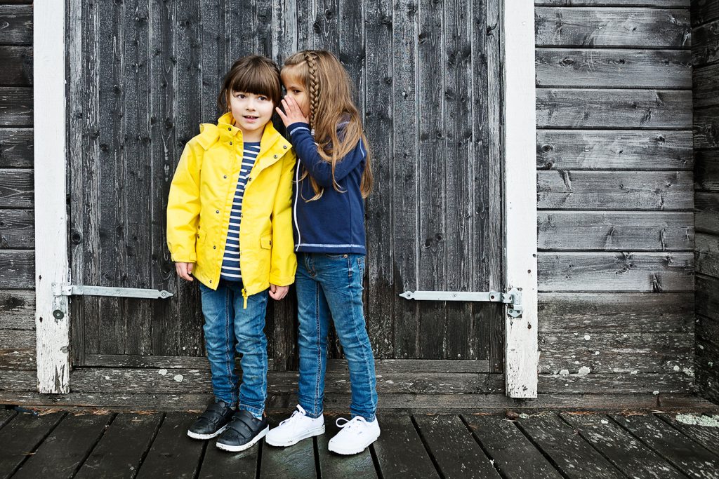 Children in outdoor lifestyle photoshoot by the ocean